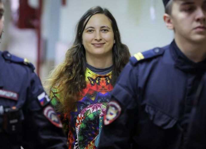 Russia jails woman for two years over protest signs